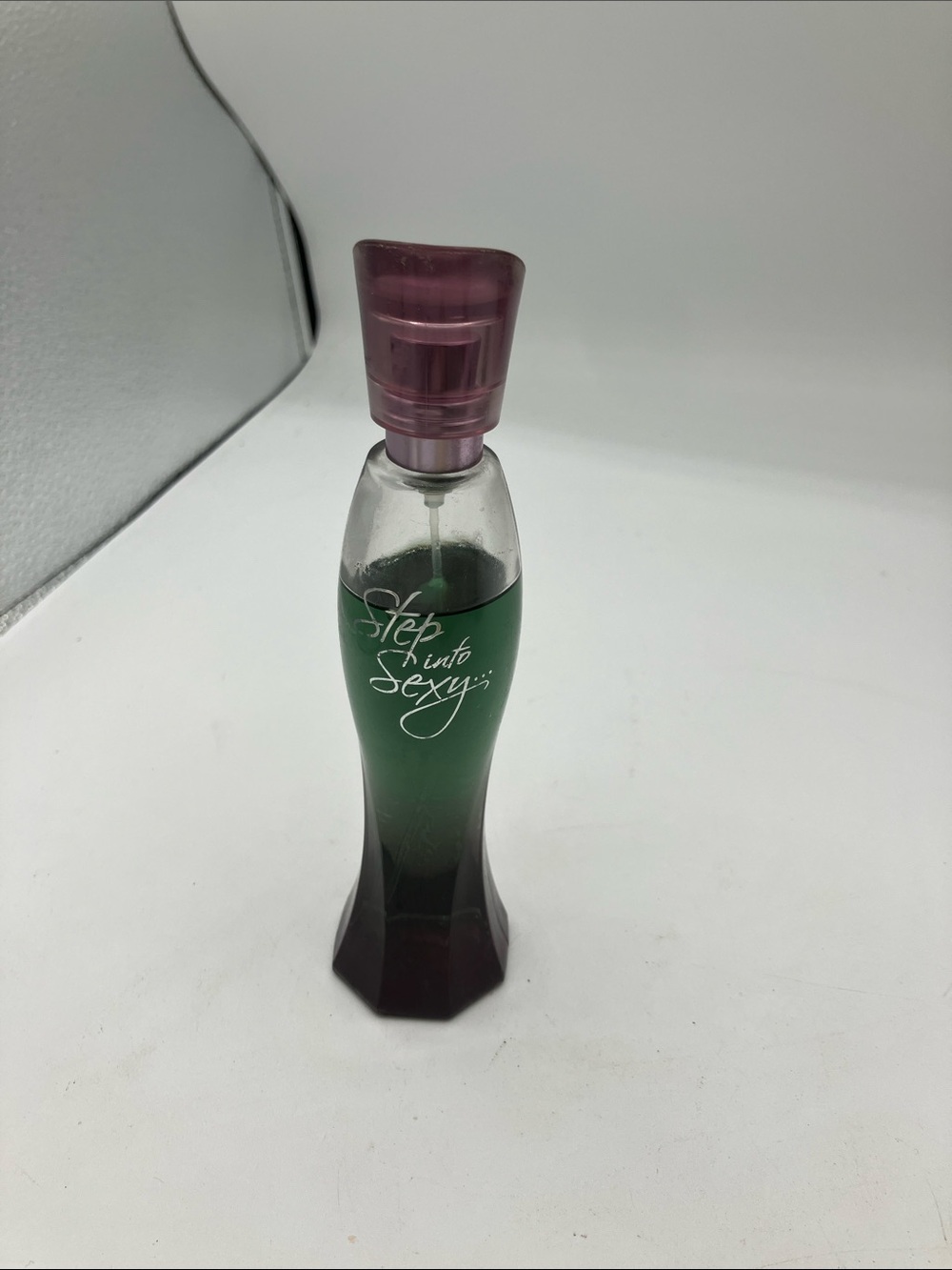 Avon Step Into Sexy Green Bottle with Purple Cap